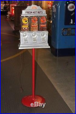 1940s Vintage Challenger Hot Nuts Coin-operated peanut vending machine on stand