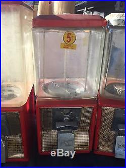 4 Vintage 5 cent Northwestern Gumball Machine Coin Op Plastic & glass globes