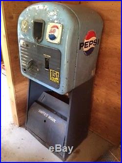 Antique Vintage Pepsi soda vending machine on stand