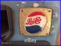 Antique Vintage Pepsi soda vending machine on stand