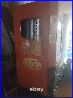 Antique candy vending machine