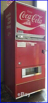Here is a Vintage Coke vending machine