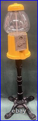 VINTAGE 1940s-1950s CAST IRON GUMBALL MACHINE YELLOW PEDESTAL CANDY DISPENSER