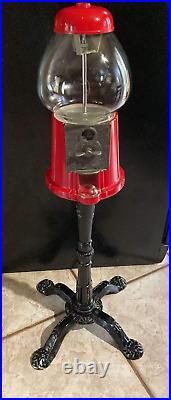 VINTAGE 1985 Carousel Red Cast Iron Glass Gumball Machine With Stand. Great cond