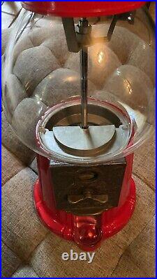 VINTAGE 1985 Carousel Red Cast Iron Glass Gumball Machine With Stand. Great cond