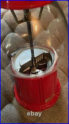 VINTAGE 1985 Carousel Red Cast Iron Glass Gumball Machine With Stand. Great cond