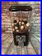 Vintage 10cent acorn glass globe with a lot of whisky corks vending machine