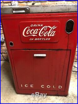Vintage 1950 coke vending machine in original and working condition