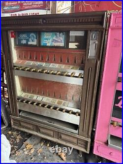 Vintage 1960's Camel cigarette vending machine. Camel Cigarettes Advertising
