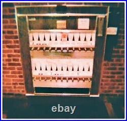 Vintage Cigarette Vending Machine still. Fully operational with blue backlight