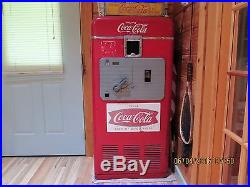 Vintage Coca Cola Vendorlator model 27A vending machine
