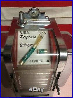 Vintage Coin Operated Perfume Dispenser Vending Machine Working. Napkin Holder