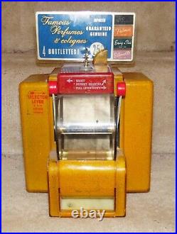 Vintage Coin Operated Perfume Vending Machine. RARE