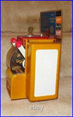 Vintage Coin Operated Perfume Vending Machine. RARE