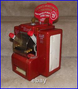 Vintage Coin Operated Perfume Vending Machine. RARE