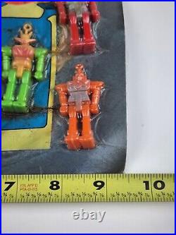 Vintage Coin Toy Machine Display Card Space Raiders Shogun Robot Charm puzzles