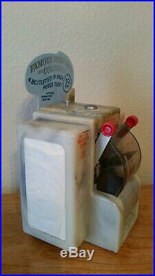 Vintage Dinner Coin-Operated Perfumes and Colognes napkin dispenser with Marquee
