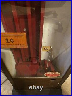 Vintage Pulver One Cent Gum Machine working in custom wood cabinet with cop