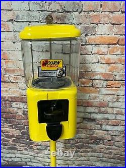 Vintage coin op Acorn original 5 cent glass candy machine restored with stand