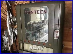 Vintage coin operated candy machine Rowe Canteen