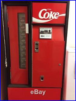 Vintage coke vending machine. A must have for collectors
