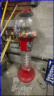 Vintage gumball machines one working, one for parts