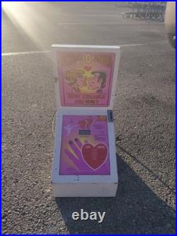 Vintage kiss O Meter Vending Machine