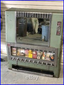 Vintage nickel candy machine for restoration