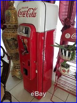 Vintage original 1950s vendo 44 coke machine and bottle rack excellent condition