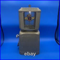 Vintage universal vendors Coin Op candy Machine 5 cents nickle with key works