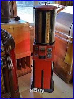 Vintage vending machine, cigarette machine, arcade machine, antique mahine