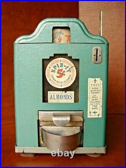 Working Vintage 5-Cent Counter top Spin-It Almond Vending Machine