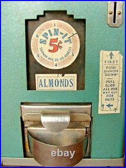 Working Vintage 5-Cent Counter top Spin-It Almond Vending Machine