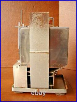 Working Vintage 5-Cent Counter top Spin-It Almond Vending Machine